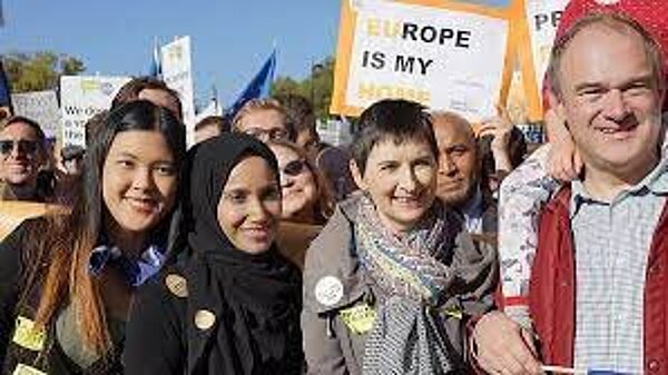 Ed Davey, Caroline Pidgeon in front of crowd